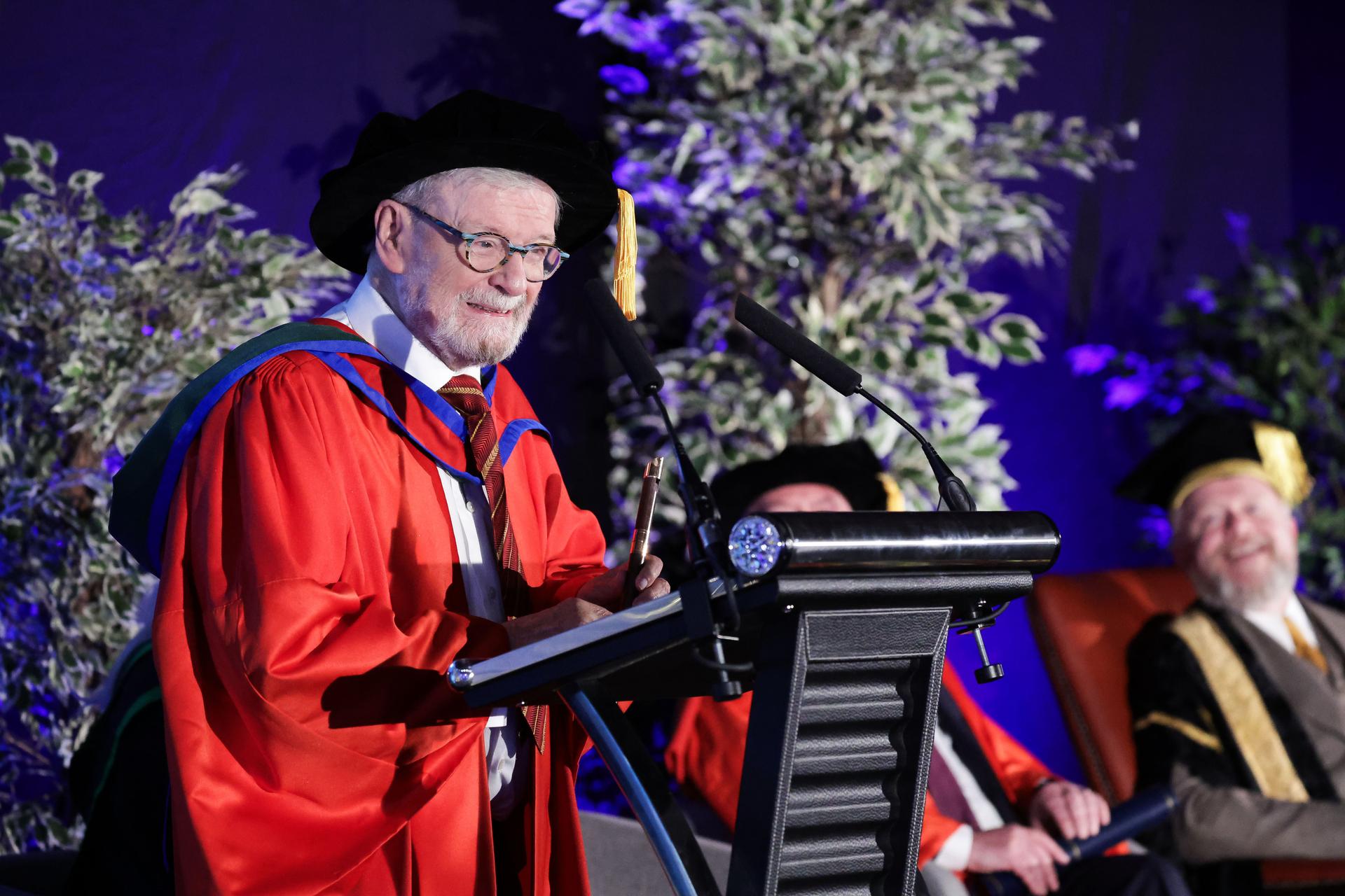Logo of Ulster University with a stylized white 